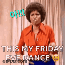A Woman In A Red Shirt Is Dancing In Front Of A Curtain With The Words `` This My Friday Eve Dance '' . GIF