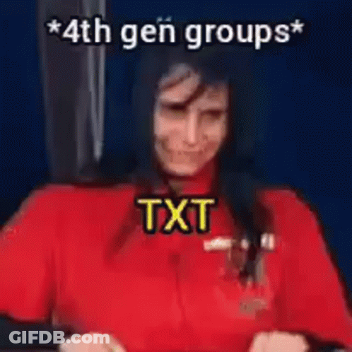 A Woman In A Red Shirt Is Standing In Front Of A Blue Wall With The Words `` 4Th Gen Groups '' Written On It . GIF