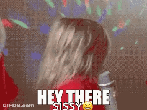 A Woman In A Red Shirt Says Hey There Sissy In Front Of A Disco Ball GIF