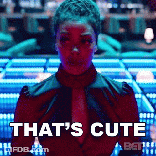 A Woman In A Red Shirt Says That 'S Cute On The Screen GIF