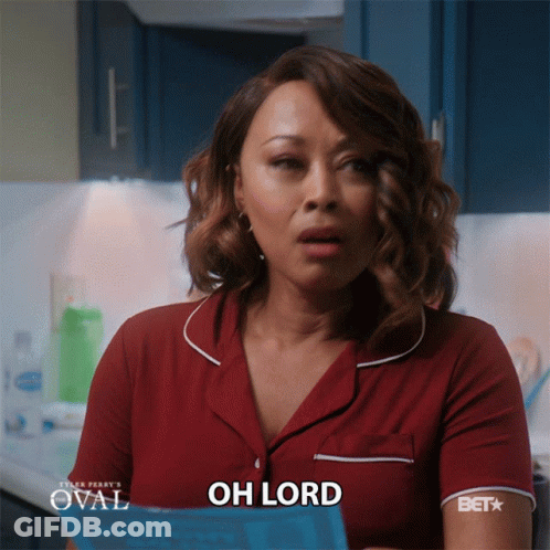A Woman In A Red Shirt That Says Oh Lord On It GIF