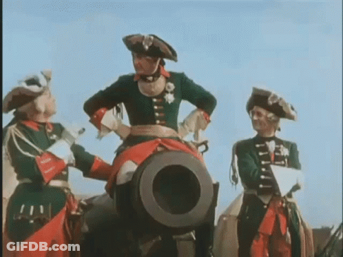 A Woman In A Red Skirt Is Flying Through The Air Holding A Giant Ball . GIF