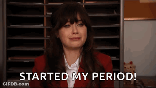 A Woman In A Red Suit Is Crying With The Words Started My Period Behind Her GIF
