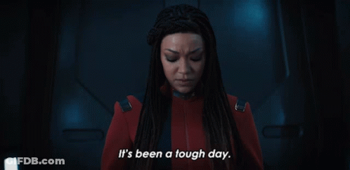A Woman In A Red Suit Is Saying It 'S Been A Tough Day GIF