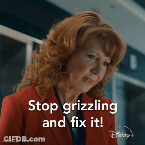 A Woman In A Red Suit Says Stop Grizling And Fix It GIF