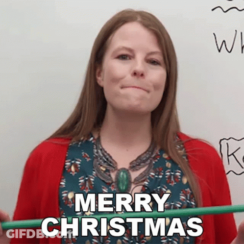 A Woman In A Red Sweater Is Holding A Green Pencil And Says Merry Christmas GIF