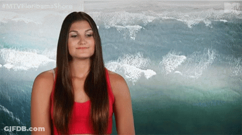 Woman In Red Tank Top By Ocean GIF