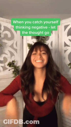 A Woman In A Red Top Is Dancing With A Caption That Says " When You Catch Yourself Thinking Negative Let The Thought Go GIF