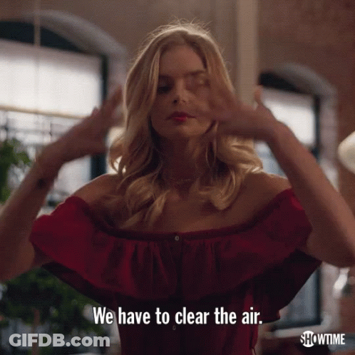 A Woman In A Red Top Says We Have To Clear The Air GIF
