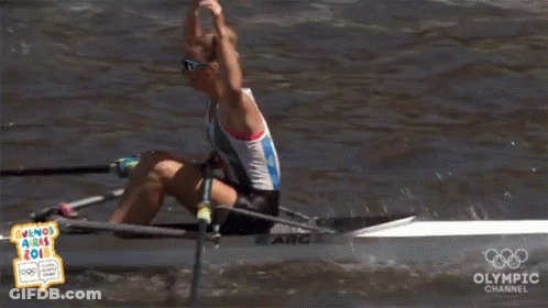 A Woman In A Rowing Boat With The Olympic Channel Logo GIF