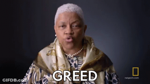 A Woman In A Scarf Says Greed In Front Of A National Geographic Logo GIF