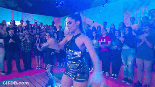 Woman In Sequin Dress Dancing At Party GIF