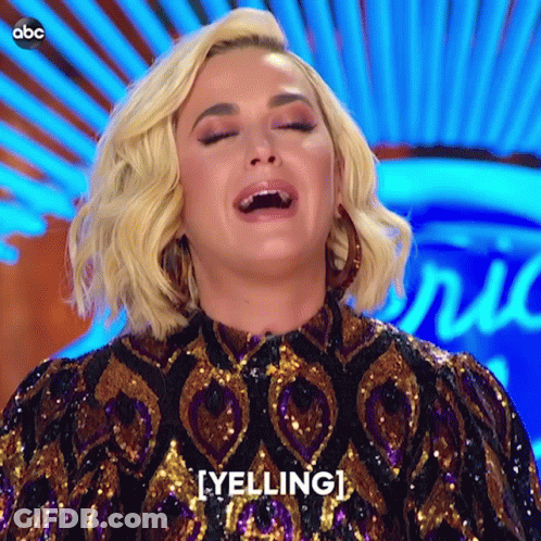 A Woman In A Sequined Dress Is Yelling At Someone GIF