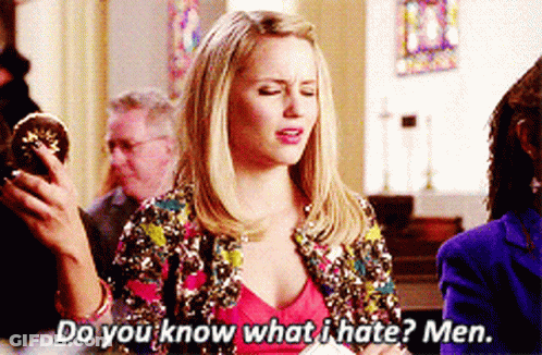 A Woman In A Sequined Jacket Is Holding A Donut And Asking Do You Know What I Hate Men GIF