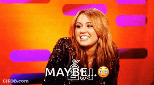 A Woman In A Sequined Jacket Is Smiling And Saying `` Maybe '' . GIF