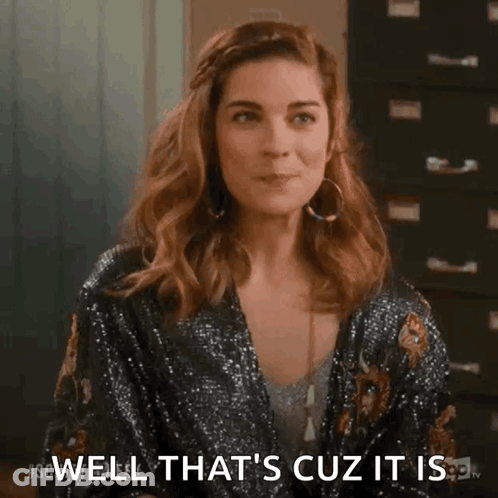 A Woman In A Sequined Kimono Is Making A Funny Face And Saying Well That 'S Cuz It Is . GIF