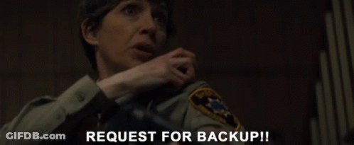 A Woman In A Sheriff 'S Uniform Is Asking For A Backup GIF