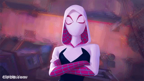A Woman In A Spiderman Costume With Her Arms Crossed GIF