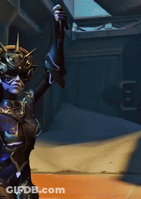 A Woman In A Steampunk Outfit Is Holding A Hammer GIF