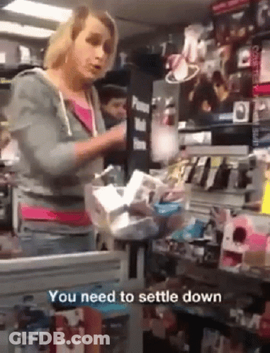 A Woman In A Store With The Words You Need To Settle Down GIF