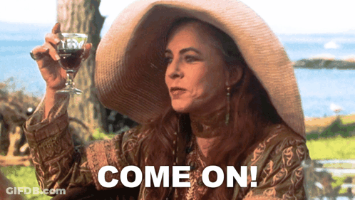 A Woman In A Straw Hat Holds A Glass Of Wine And Says " Come On " GIF