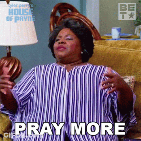 A Woman In A Striped Shirt Is Sitting On A Couch Saying Pray More GIF