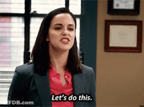 A Woman In A Suit And Pink Shirt Says Let 'S Do This . GIF