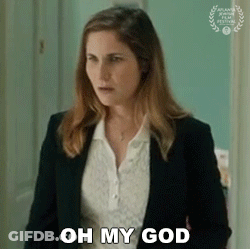 Woman In Suit Saying Oh My God GIF
