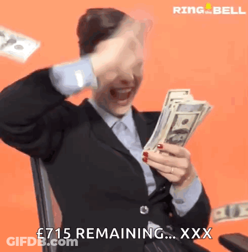 A Woman In A Suit Is Holding A Bunch Of Money And Says " £ 715 Remaining " GIF