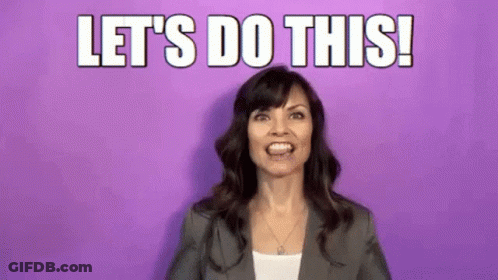 A Woman In A Suit Is Making A Funny Face And Saying `` Let 'S Do This '' . GIF
