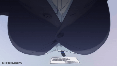 A Woman In A Suit Is Sitting At A Desk With A Piece Of Paper On The Table GIF