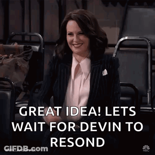 A Woman In A Suit Is Sitting In A Chair With The Words Great Idea Lets Wait For Devin To Resend Below Her GIF