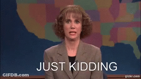 A Woman In A Suit Is Sitting In Front Of A Map Of The United States . GIF