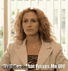 A Woman In A Suit Is Sitting In Front Of A Window And Says Well See That Pisses Me Off GIF