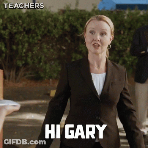 A Woman In A Suit Says Hi Gary In White Letters GIF