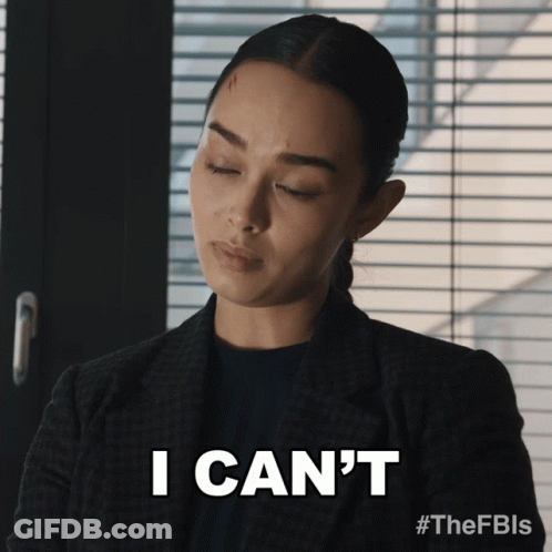 A Woman In A Suit Says I Can 'T With Her Eyes Closed GIF