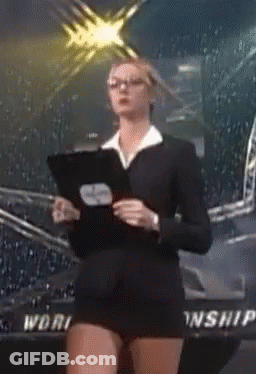 A Woman In A Suit Stands In Front Of A Sign That Says Worship GIF