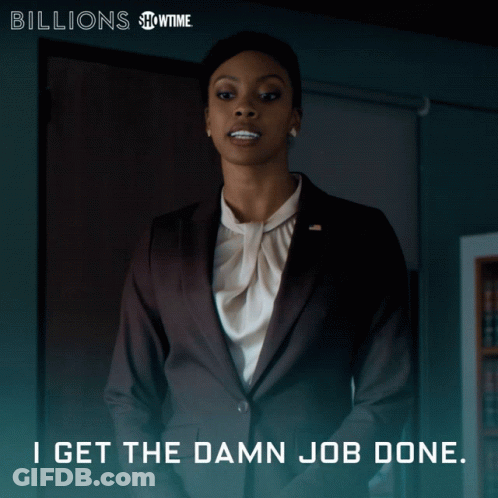 A Woman In A Suit With The Words I Get The Damn Job Done On The Bottom GIF