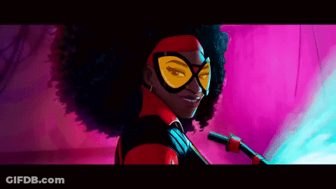 A Woman In A Superhero Costume Is Smiling GIF