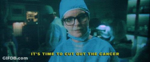 A Woman In A Surgical Gown With The Words " It 'S Time To Cut Out The Cancer " Above Her GIF