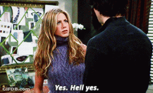 A Woman In A Sweater Says Yes Hell Yes To A Man GIF