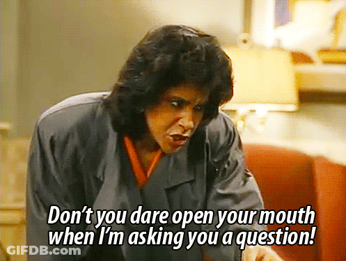 A Woman In A Trench Coat Says Do N't You Dare Open Your Mouth When I 'M Asking You A Question GIF