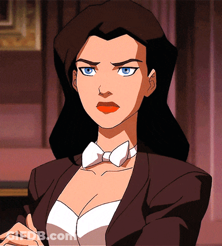 A Woman In A Tuxedo And Bow Tie Looks Angry GIF