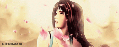 A Woman In A Video Game Is Surrounded By Pink Flowers GIF