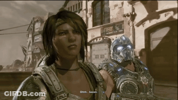 A Woman In A Video Game Is Talking To A Man In A Gears Of War Video Game GIF