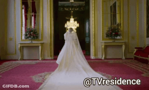 A Woman In A Wedding Dress Is Standing In A Room With The Words @Tvresidence Written Below Her GIF