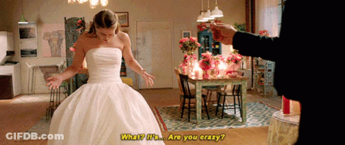 A Woman In A Wedding Dress Says " What I 'M ... Are You Crazy " GIF