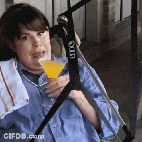 Woman In Wheelchair Drinking Etoo Martini GIF