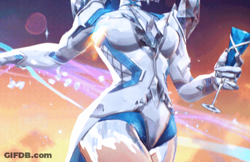 A Woman In A White And Blue Suit Is Holding A Glass GIF