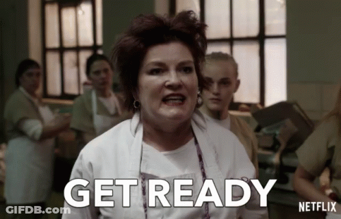 A Woman In A White Apron Says Get Ready On A Netflix Ad GIF